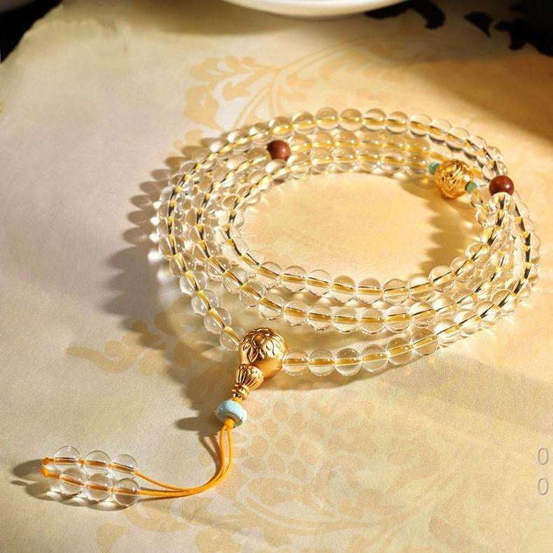 Yellow Jambhala 108-Bead White Crystal Mala Bracelet — Clear Quartz & Sandalwood for Wealth Practice Tibet Art