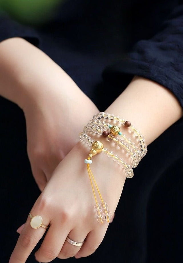 Yellow Jambhala 108-Bead White Crystal Mala Bracelet — Clear Quartz & Sandalwood for Wealth Practice Tibet Art