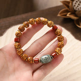 Pulsera de hueso de yak dorado Dzi