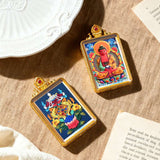 Tibetan Thangka Tsa-Tsa Pendant — Hand-Painted Deity Amulet in Gold-Plated Frame Tibet Art