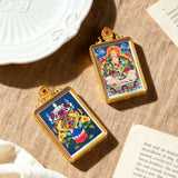 Tibetan Thangka Tsa-Tsa Pendant — Hand-Painted Deity Amulet in Gold-Plated Frame Tibet Art