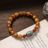 Pulsera de hueso de yak dorado Dzi