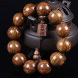 Golden Silk Sandalwood Mala Bracelet — Natural Wood Beads with Carved Blessing Pendant Tibet Art