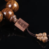 Golden Silk Sandalwood Mala Bracelet — Natural Wood Beads with Carved Blessing Pendant Tibet Art