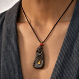 agarwood-faceless-buddha-pendant-model-a-outfit-a-closeup-01