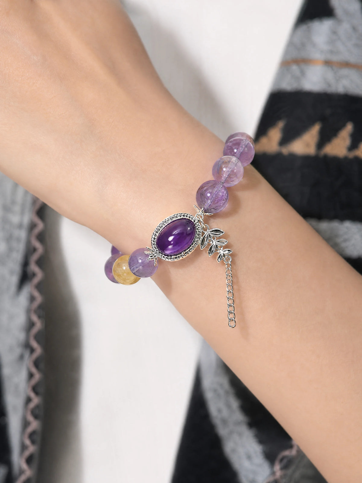 amethyst-cabochon-leaf-charm-bracelet-model-a-outfit-a-closeup-01