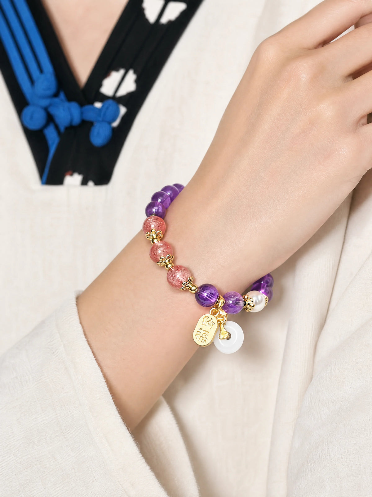 amethyst-strawberry-quartz-fortune-bracelet-model-a-outfit-a-closeup-01