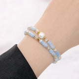 aquamarine-double-wrap-pearl-bracelet-model-a-outfit-a-closeup-01