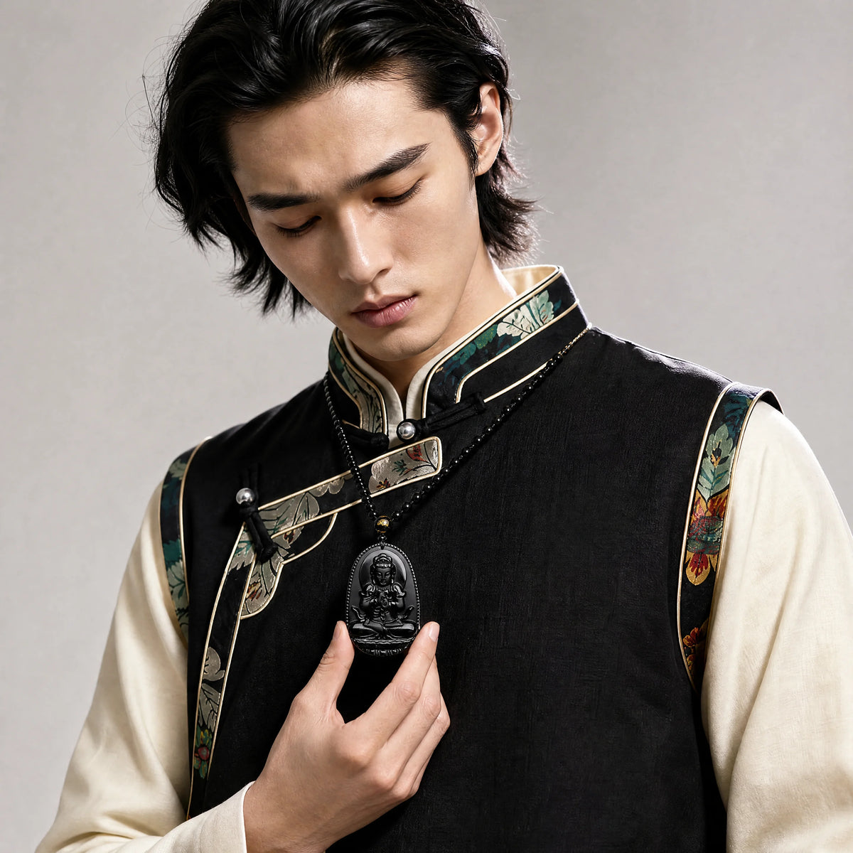 black-obsidian-buddhist-figure-necklace-model-a-outfit-a-fashion-01