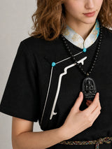 black-obsidian-buddhist-figure-necklace-model-b-outfit-b-fashion-01