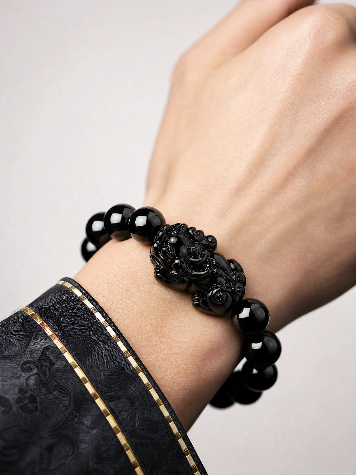 black-obsidian-pixiu-bracelet-wealth-model-a-outfit-a-closeup-01