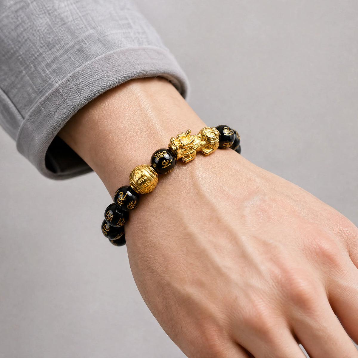 black-obsidian-pixiu-mantra-bracelet-model-a-outfit-a-closeup-01