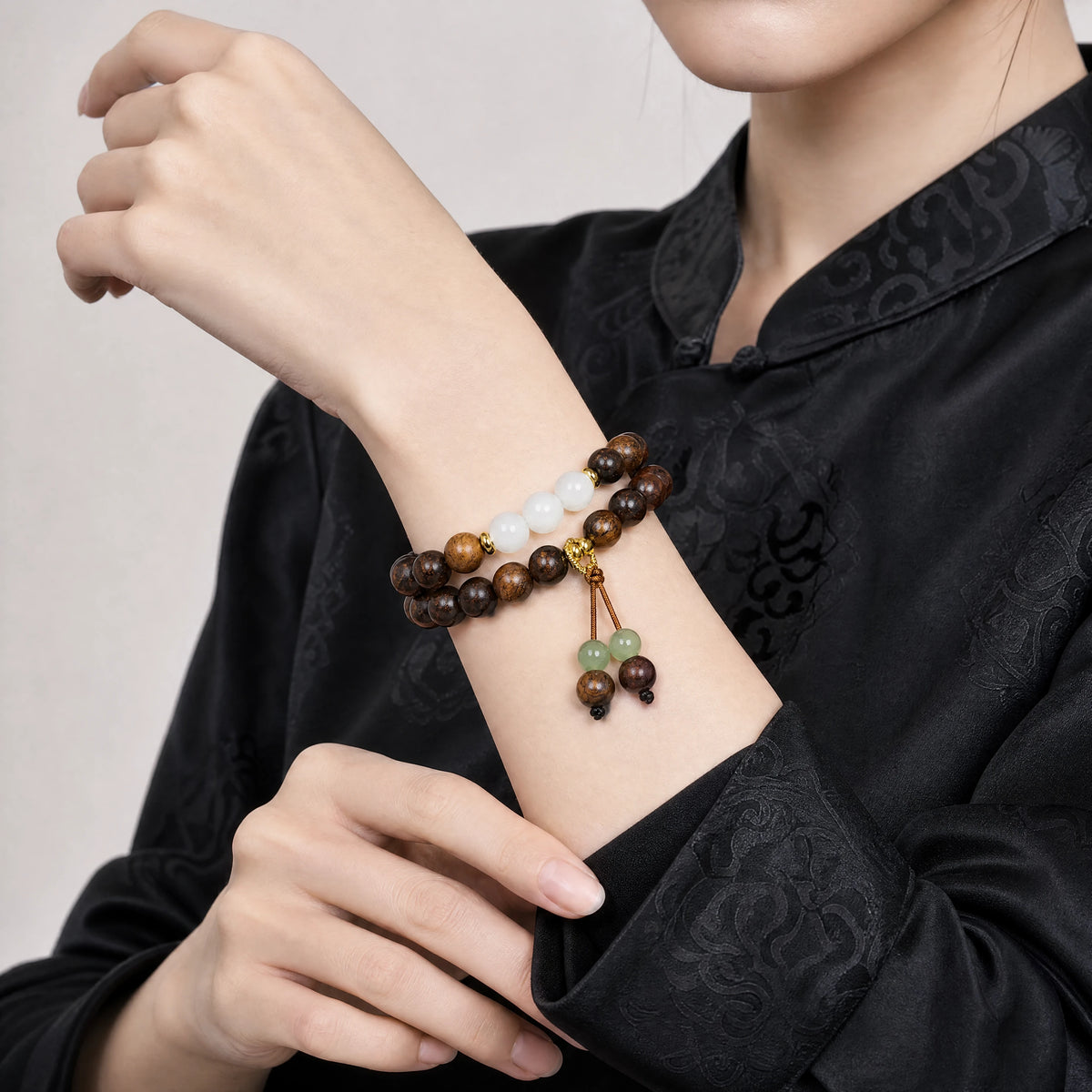 black-rosewood-gold-tassel-wrist-mala-model-b-outfit-b-fashion-01