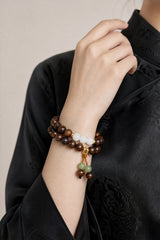 black-rosewood-gold-tassel-wrist-mala-model-b-outfit-b-fashion-02