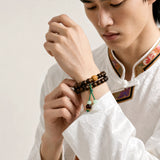black-rosewood-lotus-tassel-wrist-mala-model-a-outfit-a-fashion-01