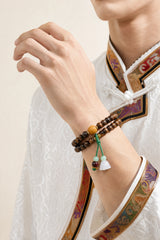 black-rosewood-lotus-tassel-wrist-mala-model-a-outfit-a-fashion-02