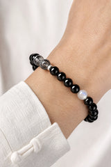 black-tourmaline-rutilated-quartz-bracelet-model-a-outfit-a-closeup-01