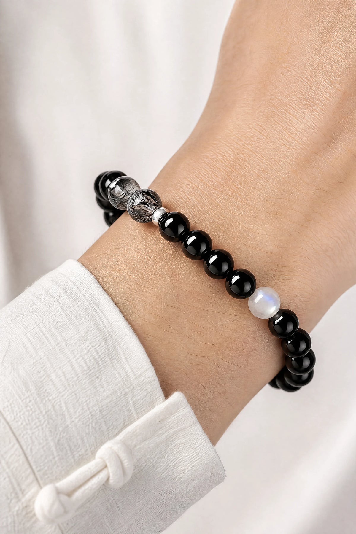 black-tourmaline-rutilated-quartz-bracelet-model-a-outfit-a-closeup-01
