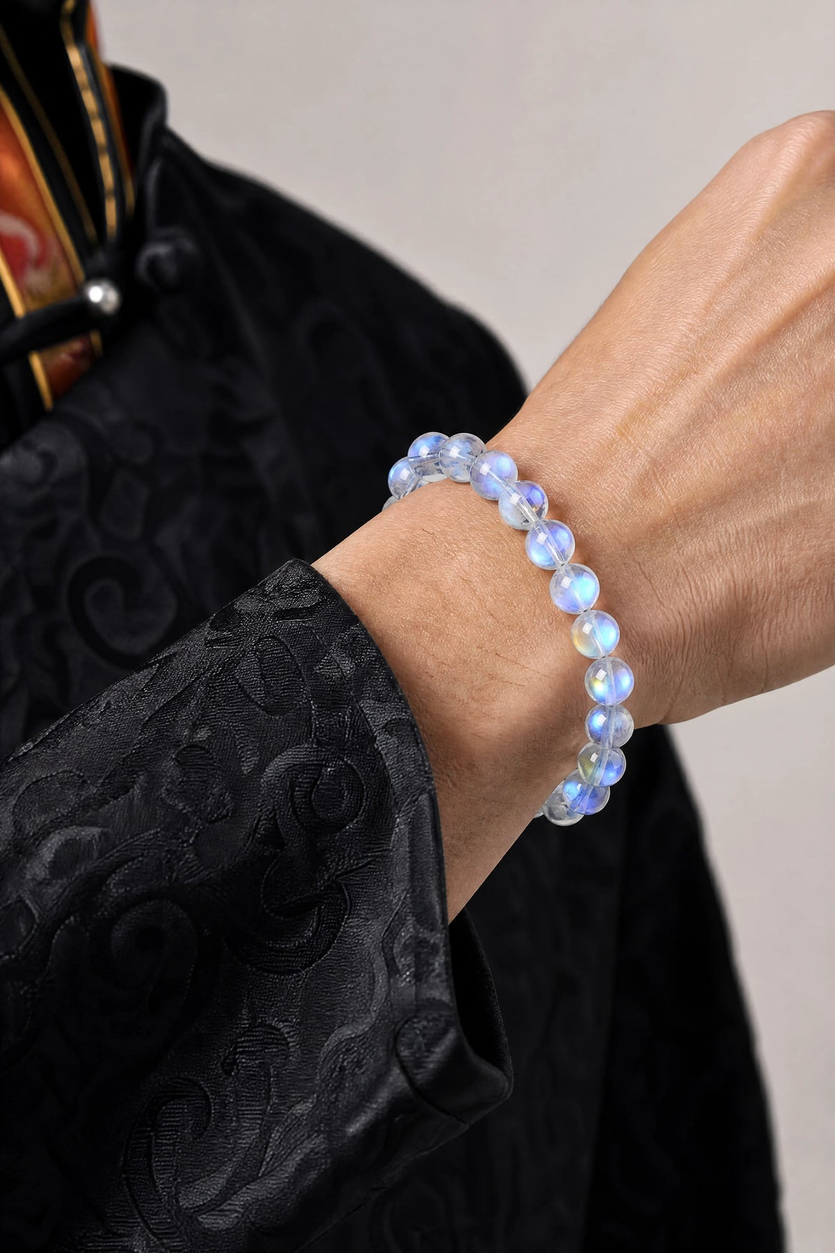 blue-flash-moonstone-bracelet-model-a-outfit-a-closeup-01