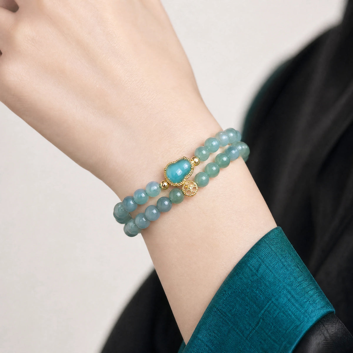 blue-jade-double-wrap-gourd-bracelet-model-a-outfit-a-closeup-01