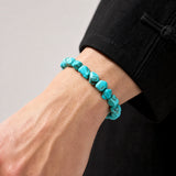 blue-magnesite-statement-bracelet-model-a-outfit-a-closeup-01