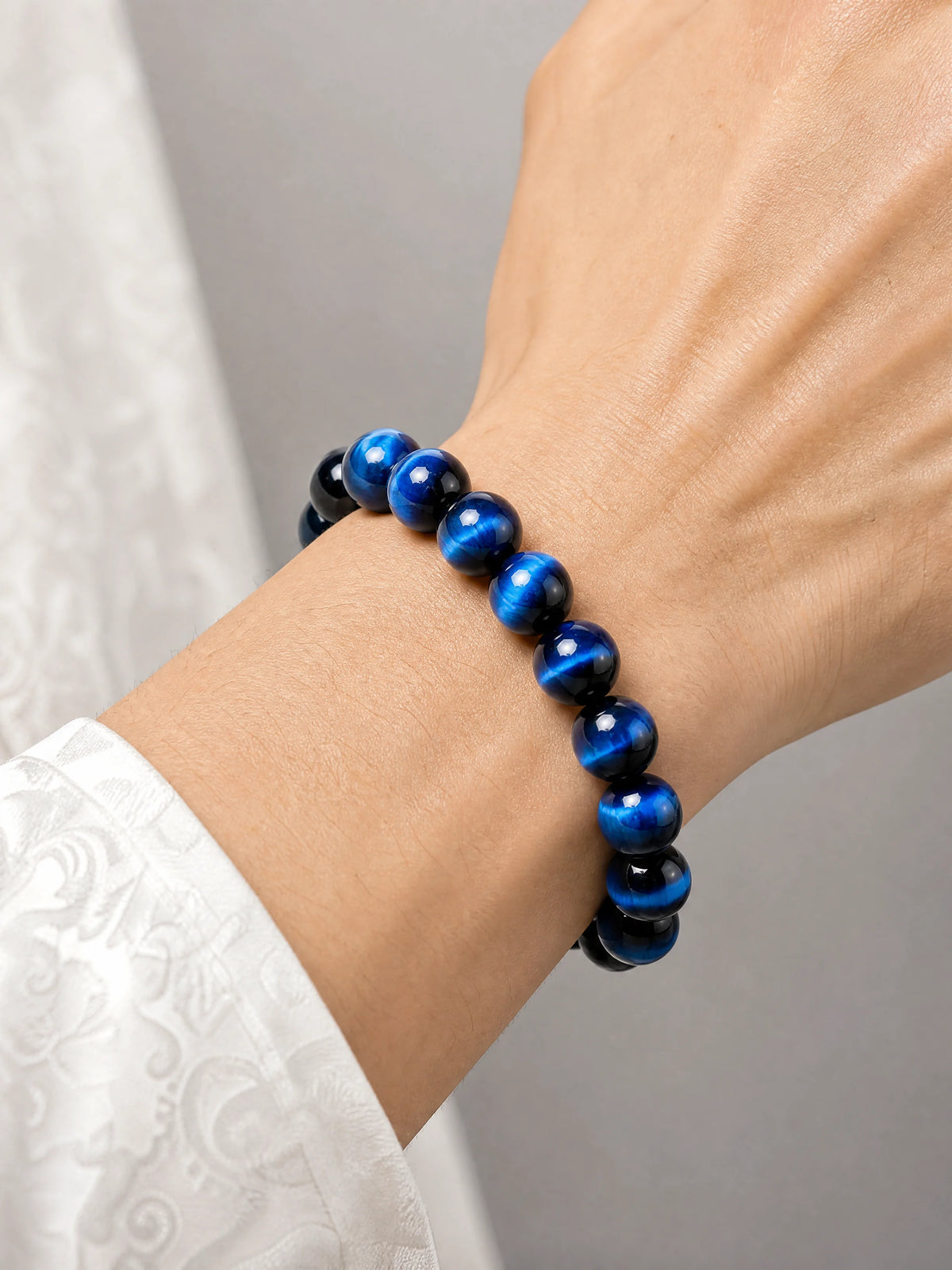 blue-tiger-eye-bracelet-calm-insight-model-a-outfit-a-closeup-01