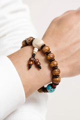 carved-yak-bone-bead-bracelet-model-a-outfit-a-closeup-01