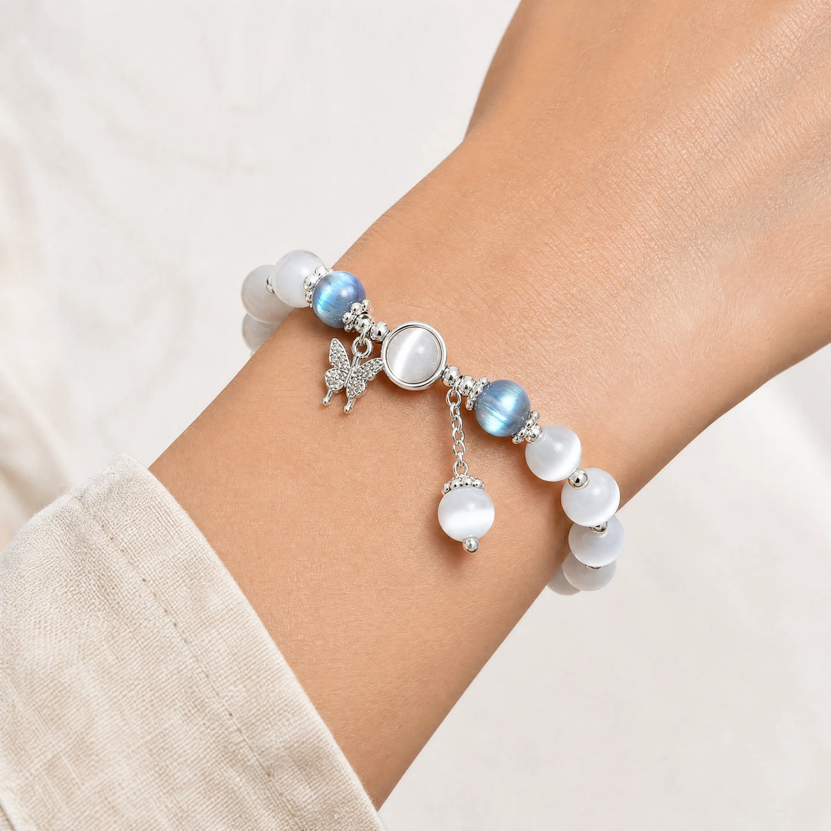 cat-eye-butterfly-star-bracelet-model-a-outfit-a-closeup-01