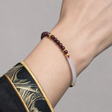 chalcedony-half-bangle-garnet-bracelet-model-a-outfit-a-closeup-01