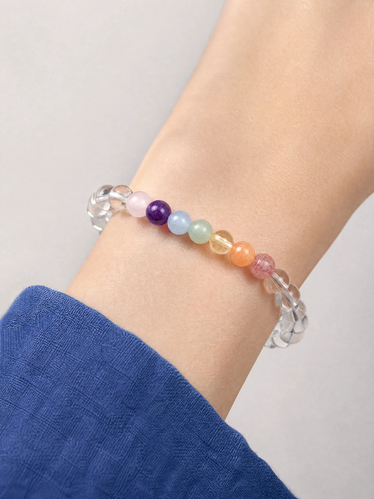 clear-quartz-seven-chakra-bracelet-model-a-outfit-a-closeup-01