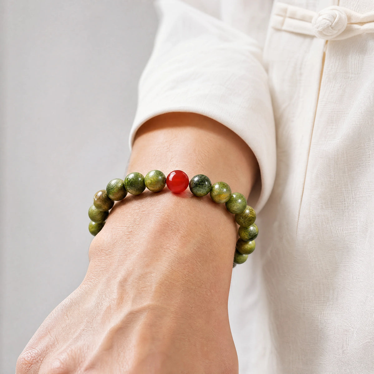 green-sandalwood-agate-mala-bracelet-model-a-outfit-a-closeup-01