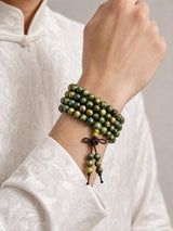 green-sandalwood-figured-grain-mala-bracelet-model-a-outfit-a-closeup-01