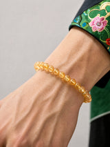 ice-clear-citrine-8mm-bracelet-model-a-outfit-a-closeup-01