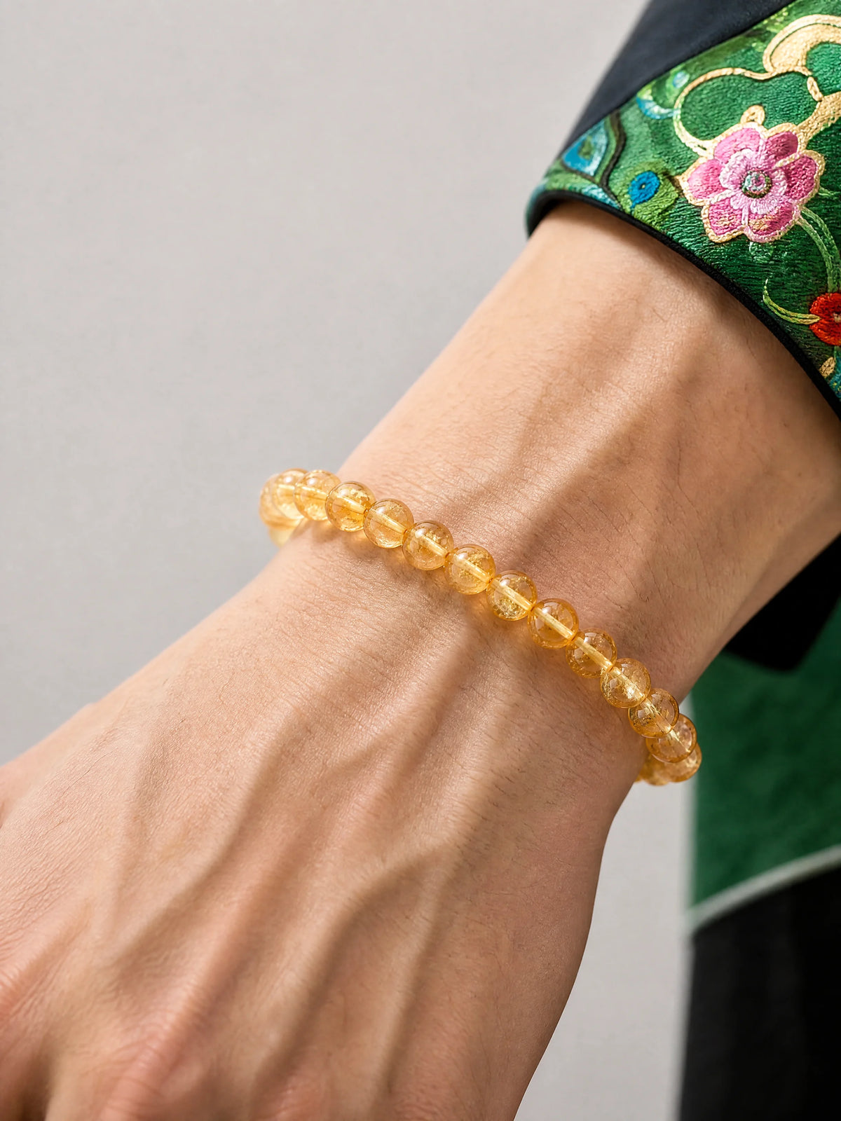 ice-clear-citrine-8mm-bracelet-model-a-outfit-a-closeup-01