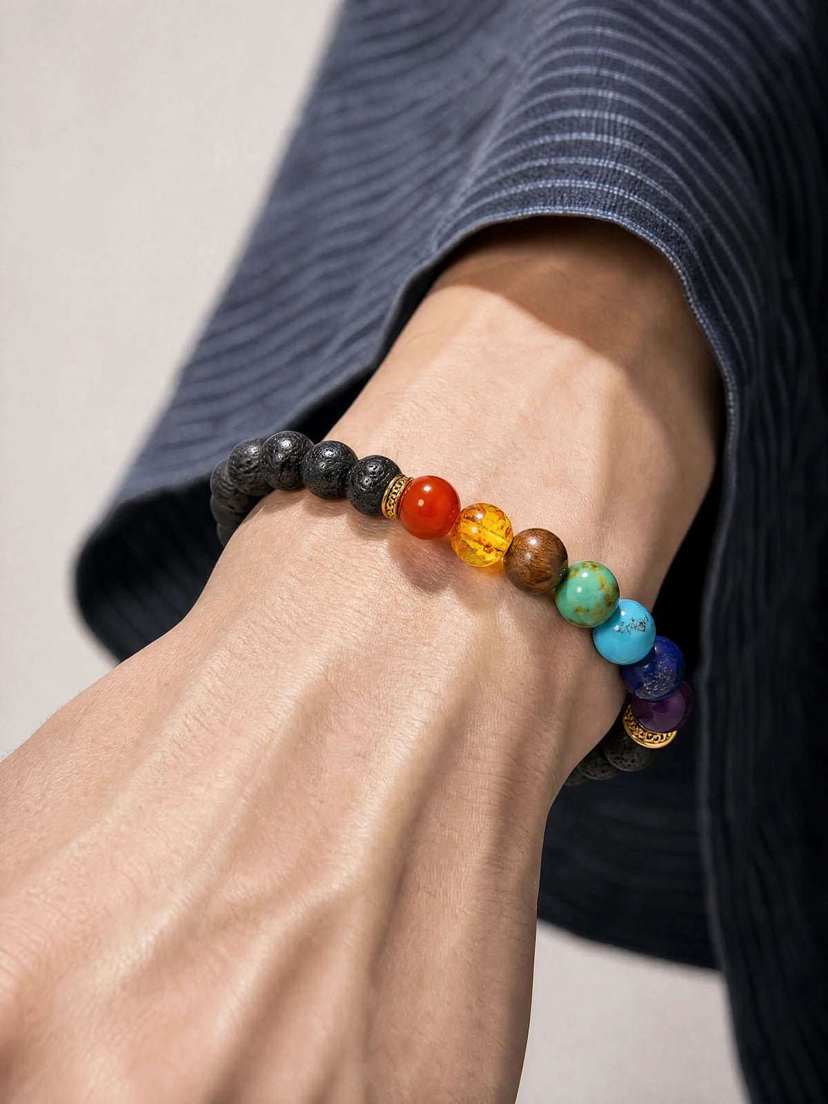 lava-stone-chakra-bracelet-grounding-model-a-outfit-a-closeup-01
