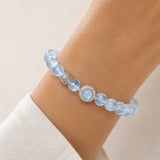 moonstone-aquamarine-halo-bracelet-model-a-outfit-a-closeup-01