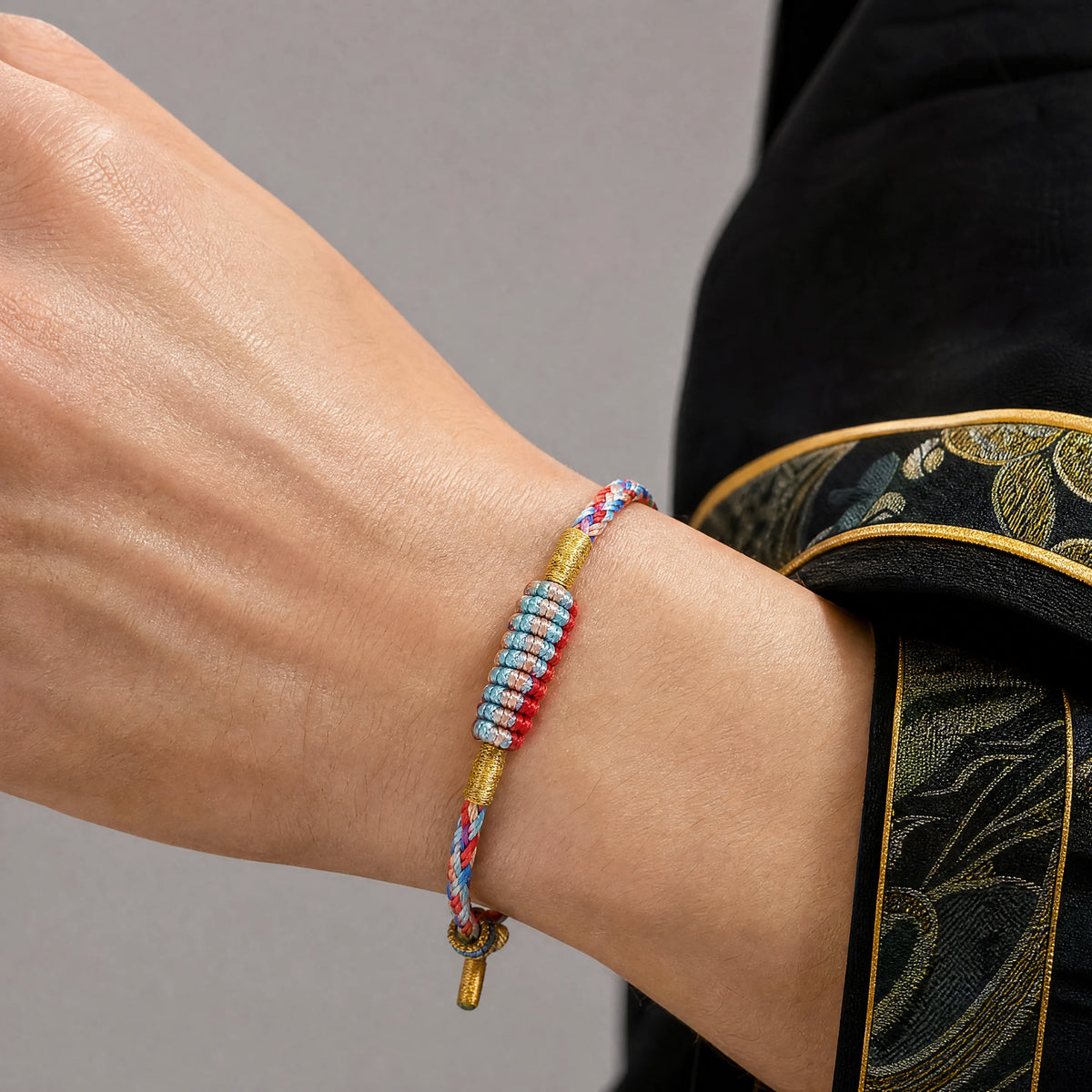 multicolor-braided-knot-bracelet-model-a-outfit-a-closeup-01