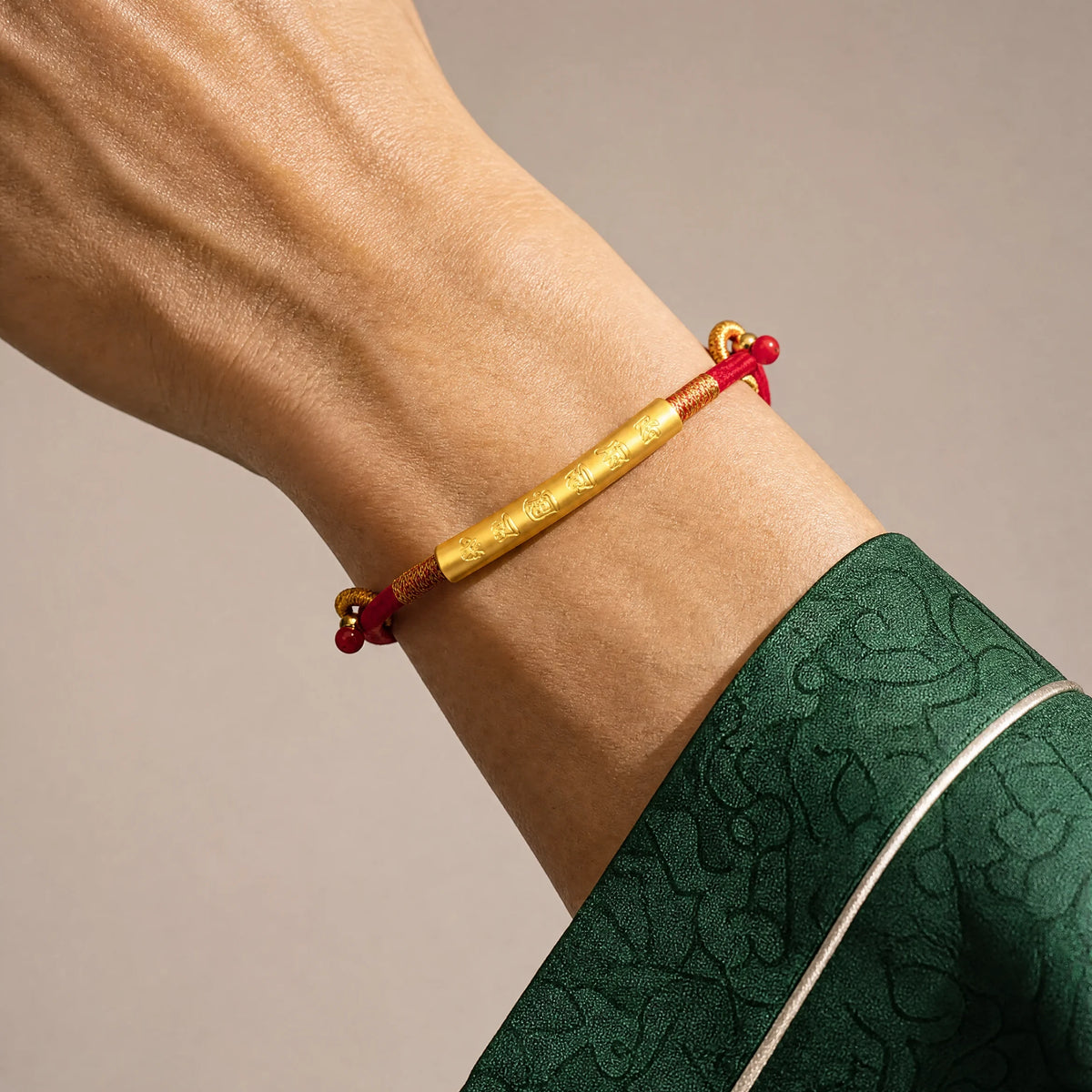 om-mani-padme-hum-red-string-bracelet-model-a-outfit-a-closeup-01