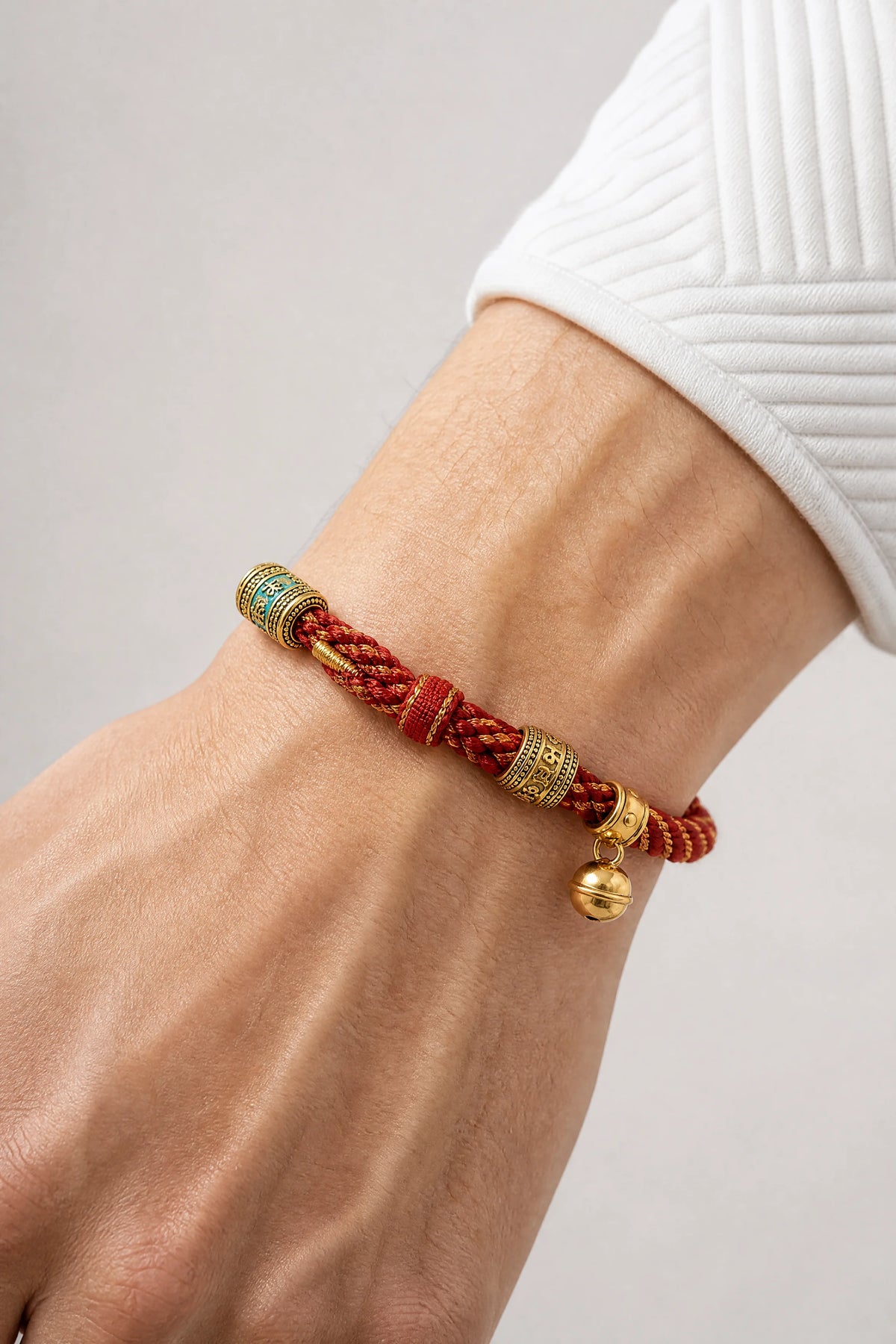 om-mani-padme-hum-woven-rope-bracelet-model-a-outfit-a-closeup-01