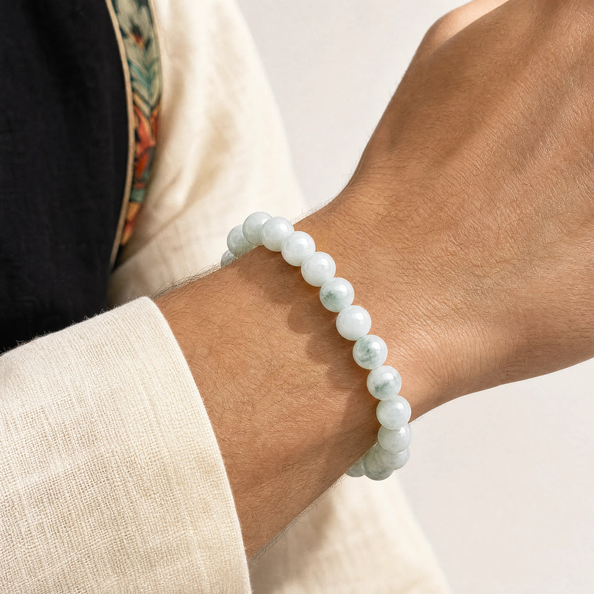 pale-green-jade-10mm-18-bead-bracelet-model-a-outfit-a-closeup-01