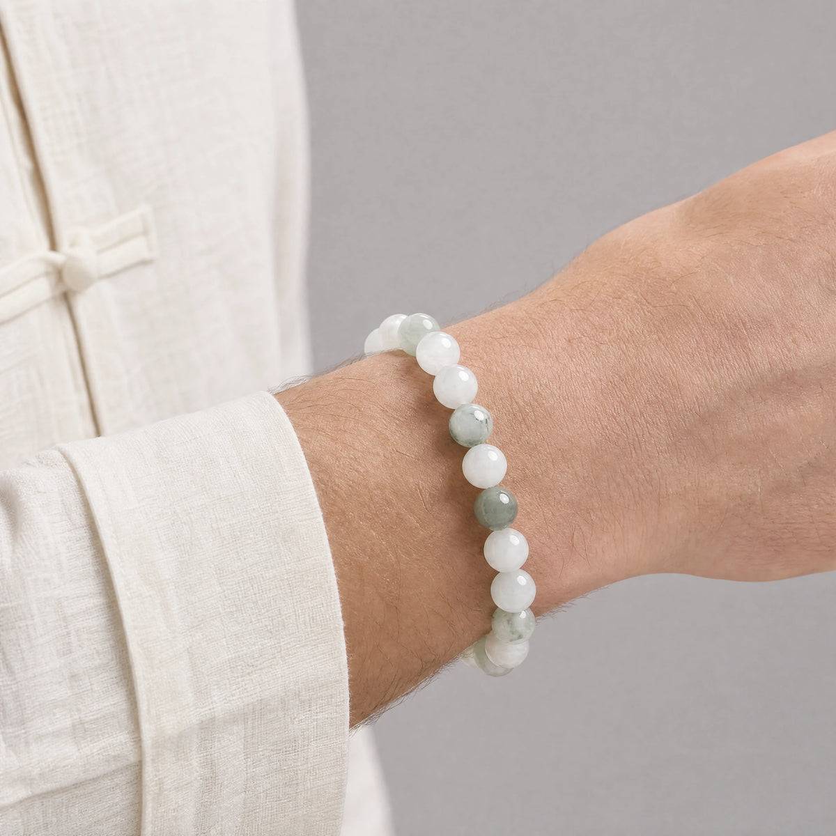 pale-green-jade-8mm-bead-bracelet-model-a-outfit-a-closeup-01