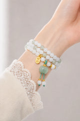 pale-jade-triple-wrap-fortune-bracelet-model-a-outfit-a-closeup-01