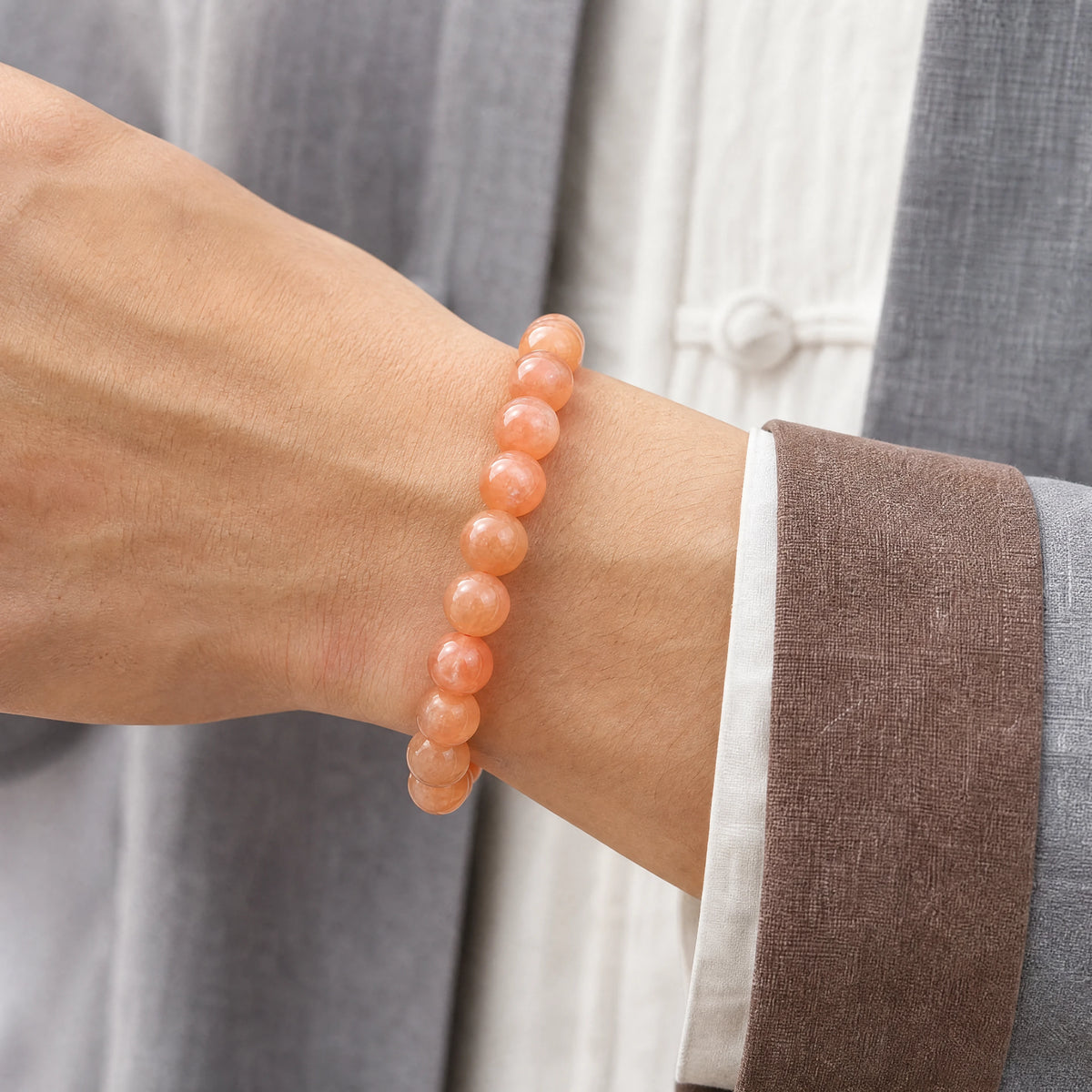 peach-sunstone-bracelet-model-a-outfit-a-closeup-01