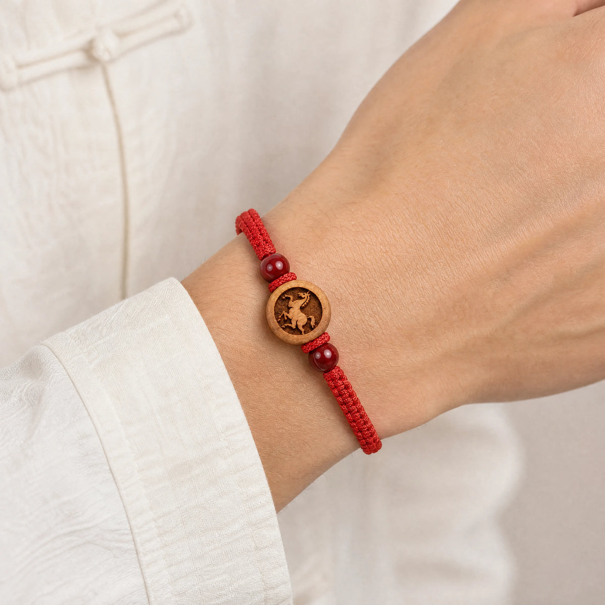 peach-wood-zodiac-red-string-bracelet-model-a-outfit-a-closeup-01