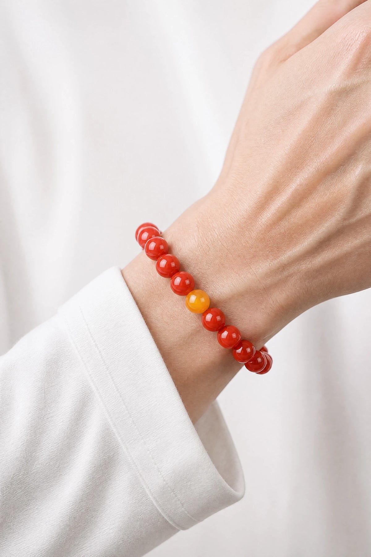 red-agate-amber-rice-bead-bracelet-model-a-outfit-a-closeup-01