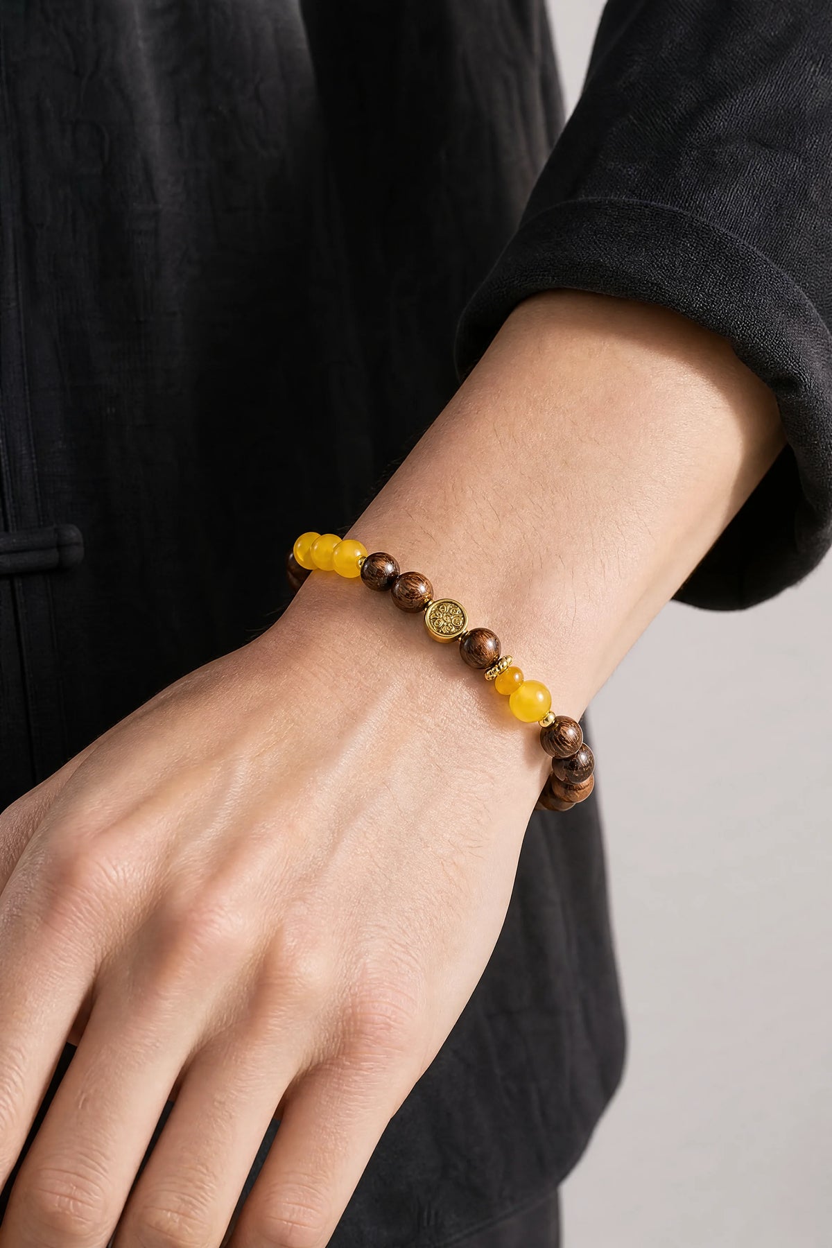 sandalwood-yellow-agate-bracelet-model-a-outfit-a-closeup-01