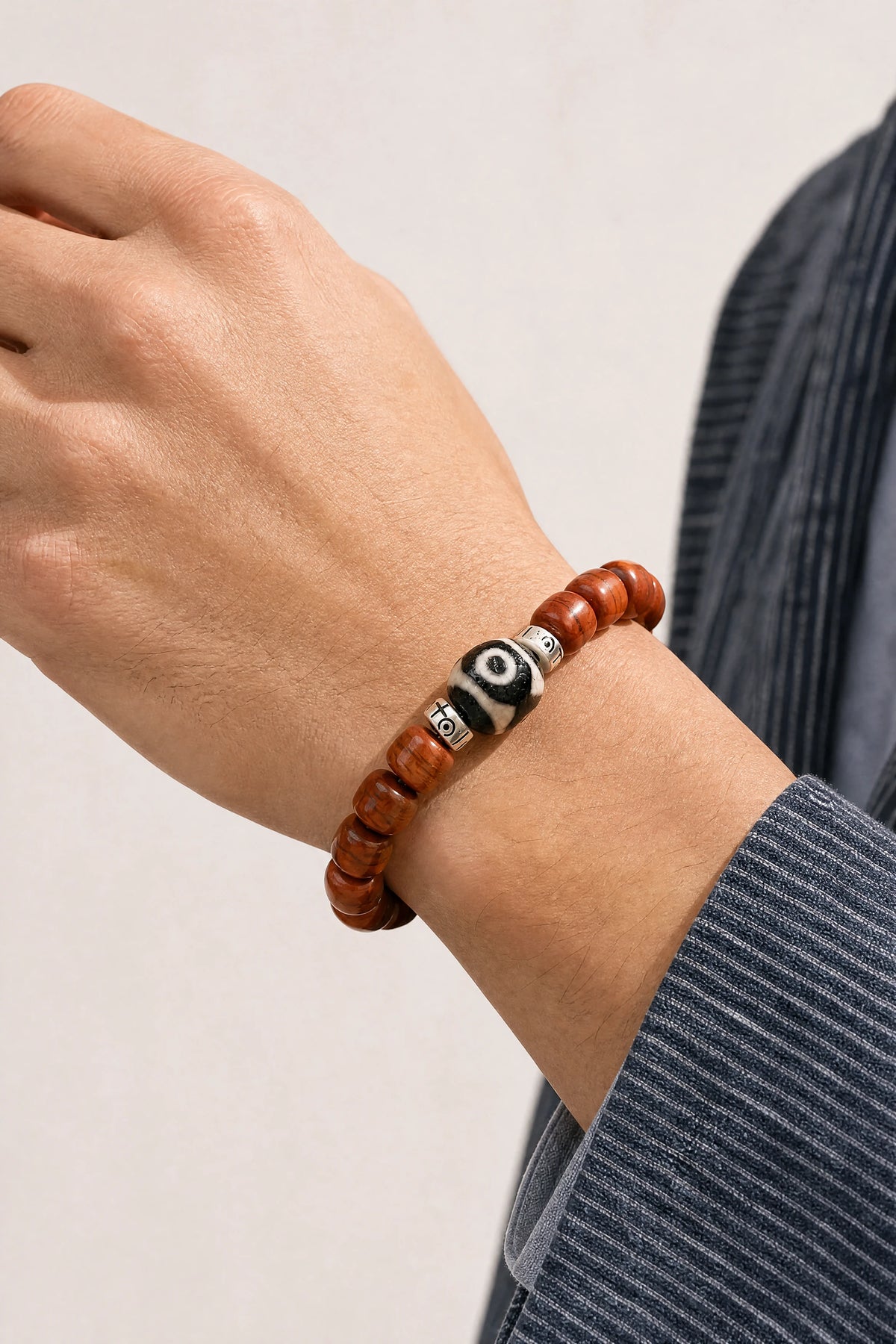 three-eye-dzi-yak-bone-bracelet-model-a-outfit-a-closeup-01