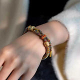 Tibetan Om Mani Padme Hum Woven Rope Bracelet — Traditional Six - Syllable Mantra - Black — Om Mani Mantra RopeTibet Art
