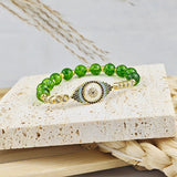 Evil Eye Bracelet - Natural Peridot - Tibet Art
