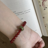 Red Agate & Jadeite Running Ring Bracelet — A Loose Green Ring on a Red Strand - 6mm with Running RingTibet Art